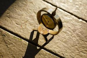 Metal gears wheels with bitcoin on a copper background photo