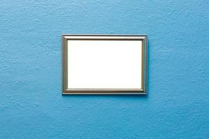 Empty picture frame on a bright solid background photo