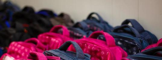 School bags in school concept photo