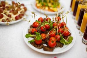 Dried tomatoes close up skewers tomato catering photo