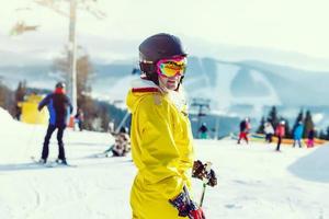 Skier, skiing, winter sport - portrait of female skier photo