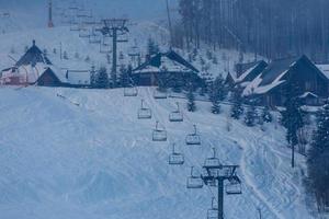 ski lifts in the morning in the mountains photo