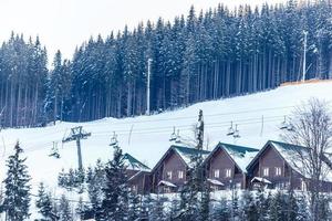 Beautiful cottages mountain resort in the winter. photo