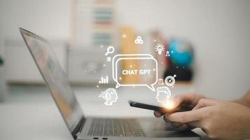 ChatGPT Chat with AI or Artificial Intelligence. woman chatting with a smart AI or artificial intelligence using an artificial intelligence chatbot developed by OpenAI. photo