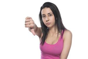 Young business arab woman isolated against a white background showing a dislike gesture, thumbs down. Disagreement concept. photo