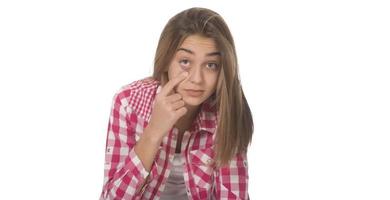 young woman with opened mouth looking amazed photo