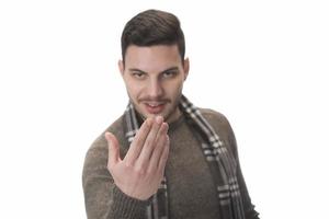 man happy smile standing hand pointing to empty space on white background. photo