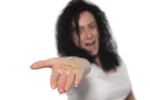 Condom in the hands of women photo