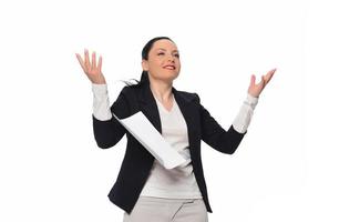 Business woman throwing work papers in the air. Stress from workload. photo