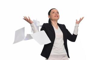 Business woman throwing work papers in the air. Stress from workload. photo