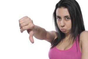Young business arab woman isolated against a white background showing a dislike gesture, thumbs down. Disagreement concept. photo