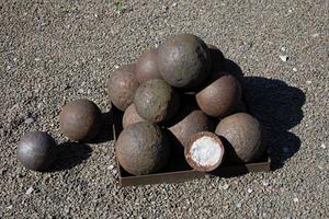 Close-up at Pile of iron cannon balls photo