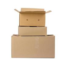 stack of closed cardboard brown paper boxes isolated on white background photo