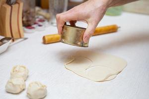 Cooking process. Manti is a very popular recipe in most cuisines, similar to dumplings made from pork, beef, lamb in the countries of the South Caucasus, Georgia, Russia, Afghanistan, and Central Asia photo