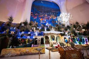 Christmas nativity crib scene in church. photo