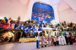 Children play nativity crib scene. photo