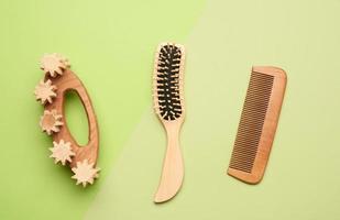 various household items from recyclable  materials on a green background photo