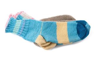 pair of striped handmade knitted warm socks photo