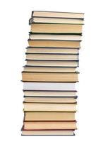 large stack of hardback books isolated on white background photo