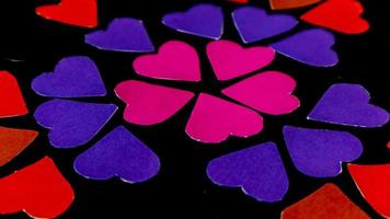 multicolored heart on black background for valentine's day photo