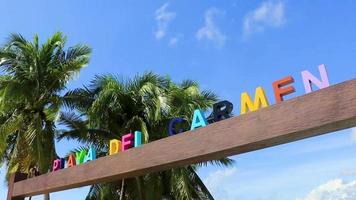 Colorful Playa del Carmen lettering sign symbol on beach Mexico. video