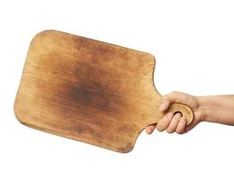 woman holding blank brown rectangular wooden board in hand photo