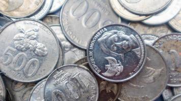 pile of rupiah coins as background photo