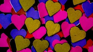 multicolored heart on black background for valentine's day photo