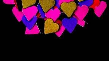 multicolored heart on black background for valentine's day photo