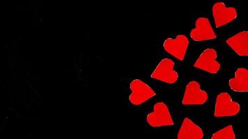 red heart on black background for valentine day photo