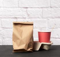 red paper disposable cups stand in the tray photo