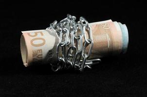 Money in chains photo
