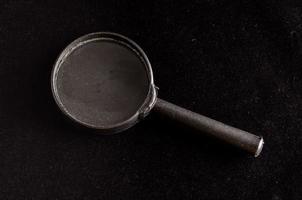 Isolated magnifying glass photo