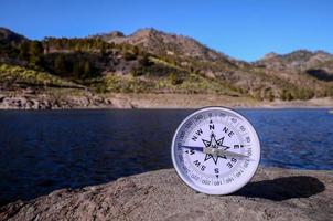 Compass on the rocks photo