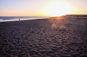 Ocean over the sunset photo