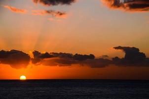 Ocean over the sunset photo