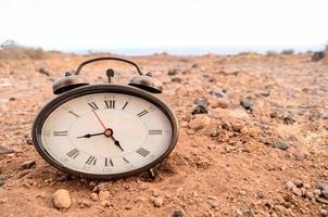 Clock on the ground photo