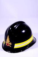 Fireman helmet on white background photo