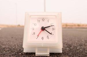 Clock on the ground photo