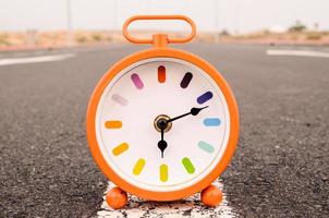 Clock on the ground photo