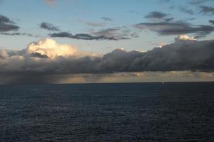 Ocean over the sunset photo