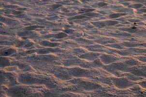 fondo de textura de arena de playa foto