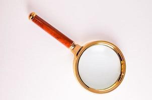 Isolated magnifying glass photo