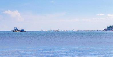 Boats yachts ship jetty beach in Playa del Carmen Mexico. photo