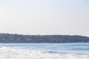 Extremely huge big surfer waves beach La Punta Zicatela Mexico. photo