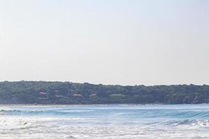 Extremely huge big surfer waves beach La Punta Zicatela Mexico. photo