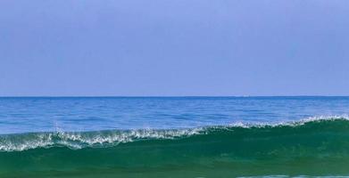 Extremely huge big surfer waves at beach Puerto Escondido Mexico. photo