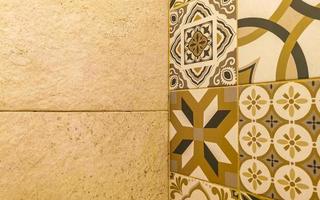 Orange and cream wall tile texture with patterns Mexico. photo