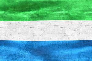 Ilustración 3d de una bandera de sierra leona - bandera de tela ondeante realista foto