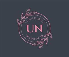 plantilla de logotipos de monograma de boda con letras iniciales de la ONU, plantillas florales y minimalistas modernas dibujadas a mano para tarjetas de invitación, guardar la fecha, identidad elegante. vector